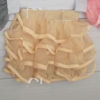 กระโปรงเด็กผู้หญิง ระบายชั้น สีครีม ขอบเอววิบวับ